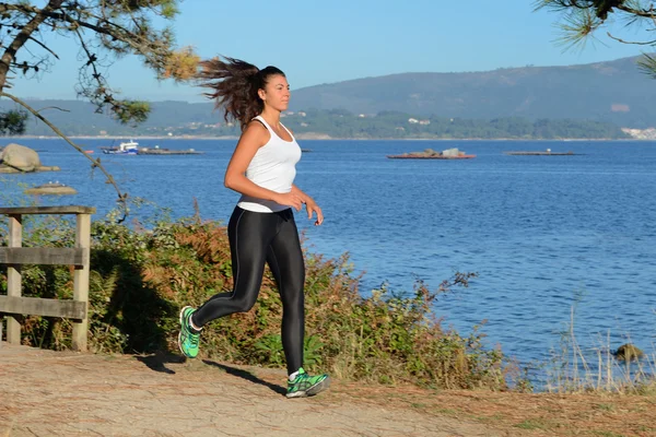 young woman jogging outdoors
