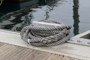 bollards on the dock closeup clipart