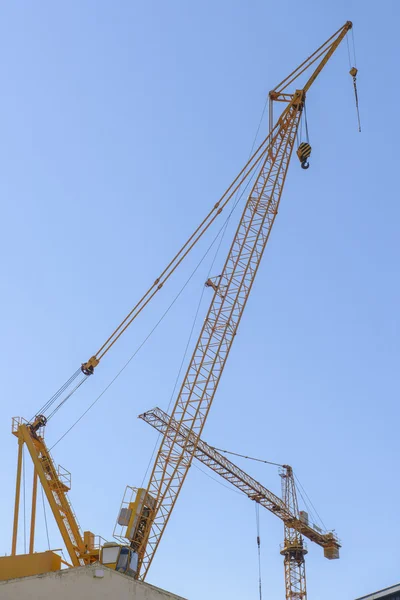 Tall crane on background of the sky — Stock Photo, Image