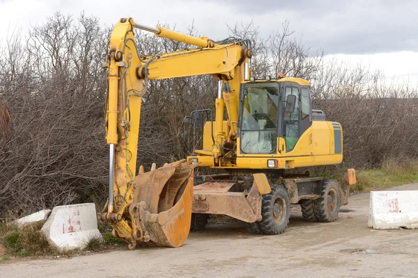 Bagger auf der Straße — Stockfoto