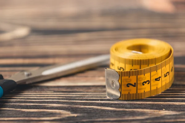 tailor tool. meter and scissors