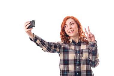 Selfie fotoğraf Smartphone'da yapma genç bir kadın portresi