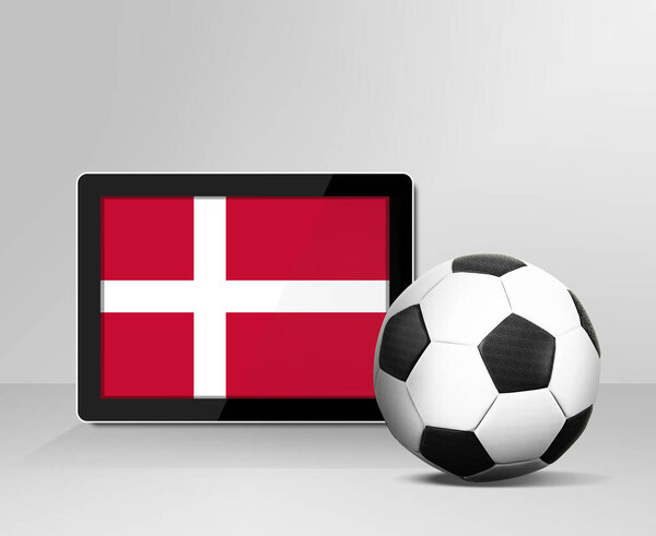 soccer ball with Denmark flag on digital tablet screen