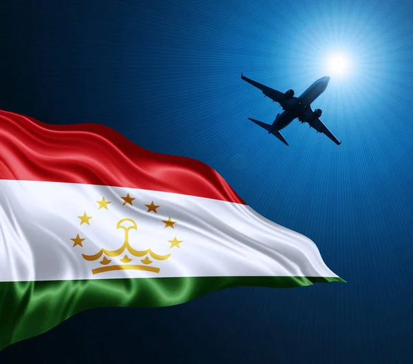 타지키스탄의 국기는 하늘을 배경으로 비행기와 만들어 — 스톡 사진