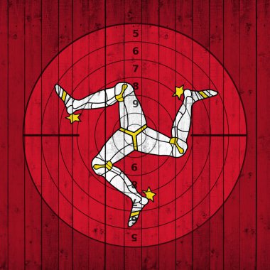 Ahşap zemin üzerinde hedefli Mann adası bayrağı