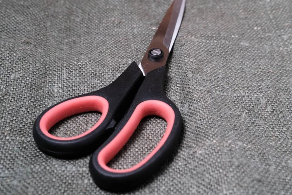 Steel Scissors Plastic Handle Sackcloth Close Selective Focus — Stock Photo, Image