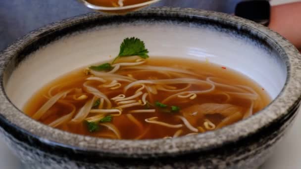 Eating Vietnamese Pho Soup Delicious Nutritious Oriental Soup — Vídeo de Stock