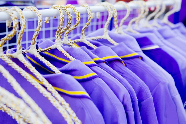 The set of purple T-shirts for sale. — Stock Photo, Image