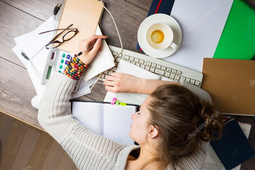 Tired student girl with books and coffee sleeping — Stock Photo ...