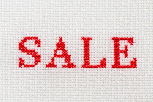 Embroidery word Sale cross stitch — Stock Photo, Image