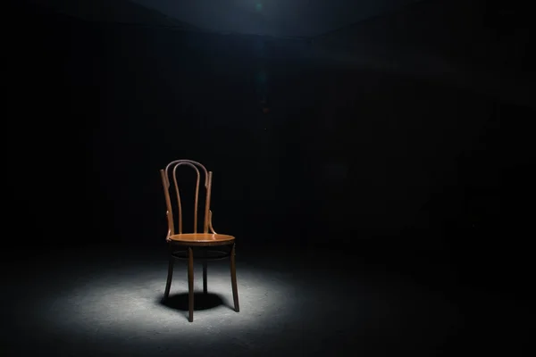 Lonely chair at the empty room Royalty Free Stock Photos