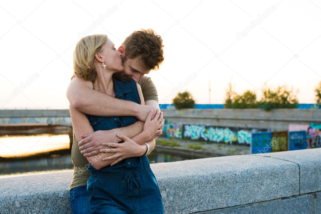 pretty couple embrace outdoor. 