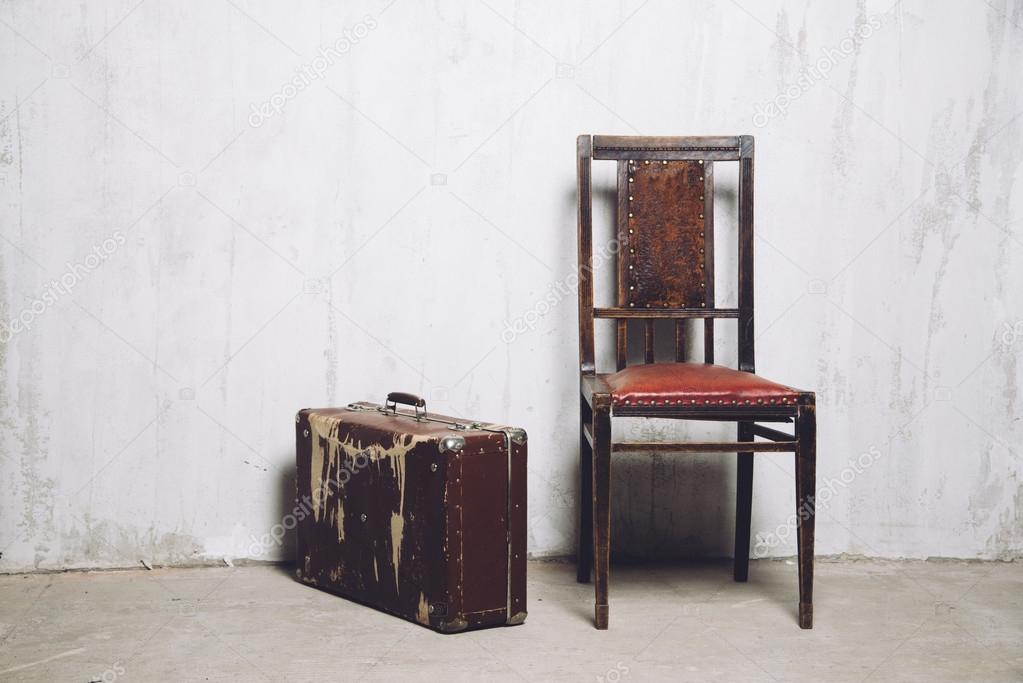 old suitcase and the chair