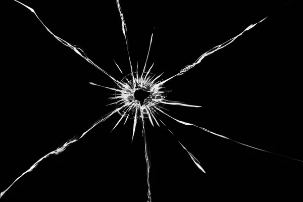 亀裂が武器のショットから壊れたガラスに与える影響 弾丸のガラスの穴 — ストック写真
