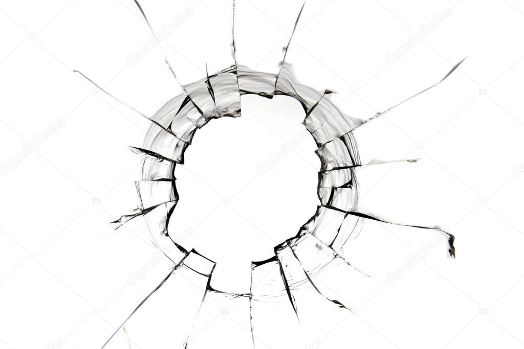 Hole in glass isolated cracks on white.
