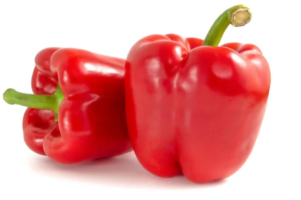 Röd Bell Pepper Två Fingrar Isolerad Vit Bakgrund — Stockfoto