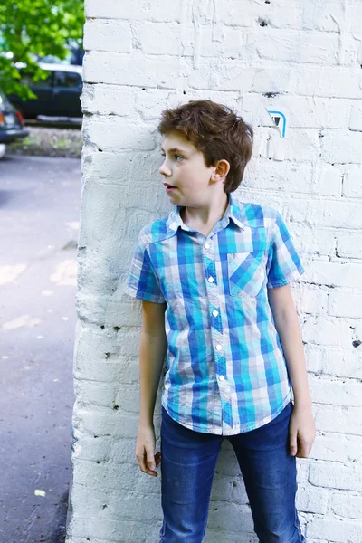 Preteen handsome boy close up photo hiding — Stock Photo, Image