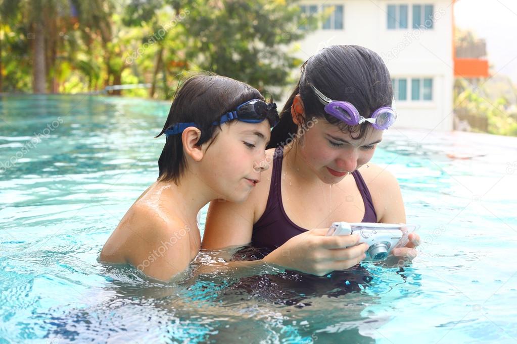 Girls Making Out In Pool