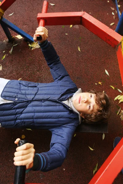 Preteen boy make push up hand exercises — Stock Photo, Image