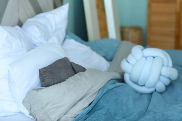 Cute modern bedroom corner blue bad, pillows, duvet closeup photo — Stock Photo, Image