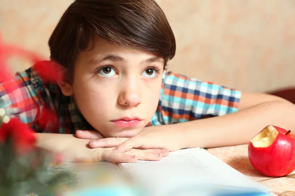 Little preteen boy do his homework has difficulties — Stock Photo, Image