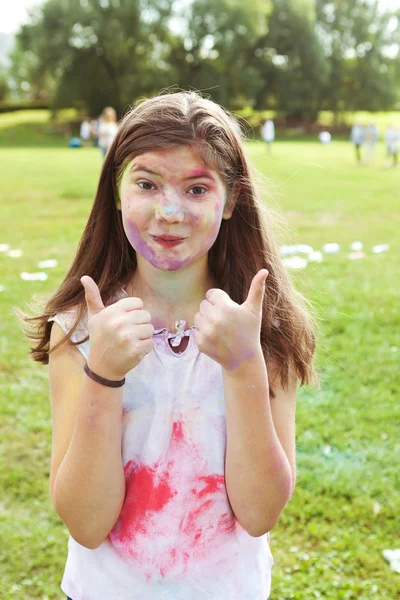 Beautiful preteen girl portrain participating  in indian color h — Stock Photo, Image