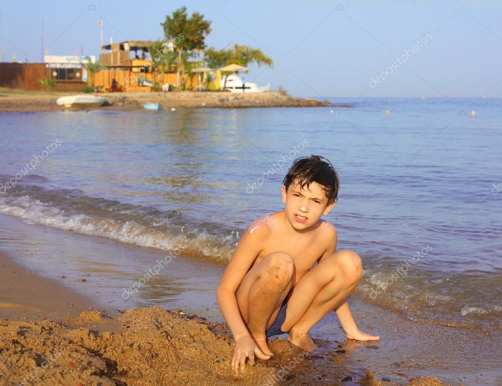 huru preteens Preteen handsome boy swimming on the red sea beach and yaht back — ストック写真 ©  Ulianna #70262535
