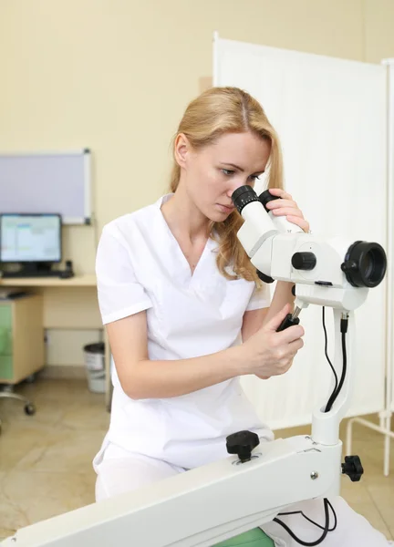 Young beautiful girl doctor make colposcop investigation for her — Stock Photo, Image