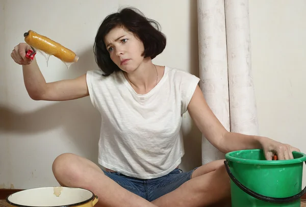 Exhausted woman prepare to make a repair — Stock Photo, Image