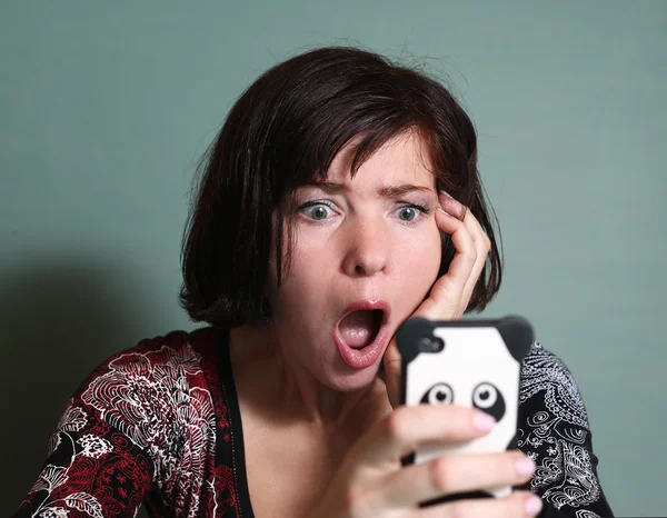 Girlfriend read all over sms from boyfriend — Stock Photo, Image