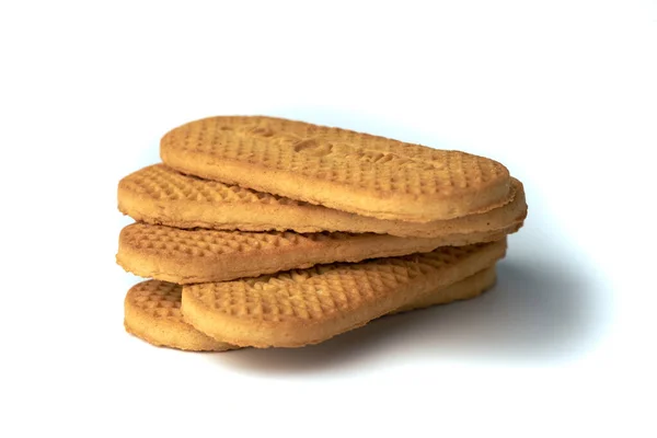 Close Pilha Biscoitos Marrons Texturizados Isolados Fundo Branco — Fotografia de Stock
