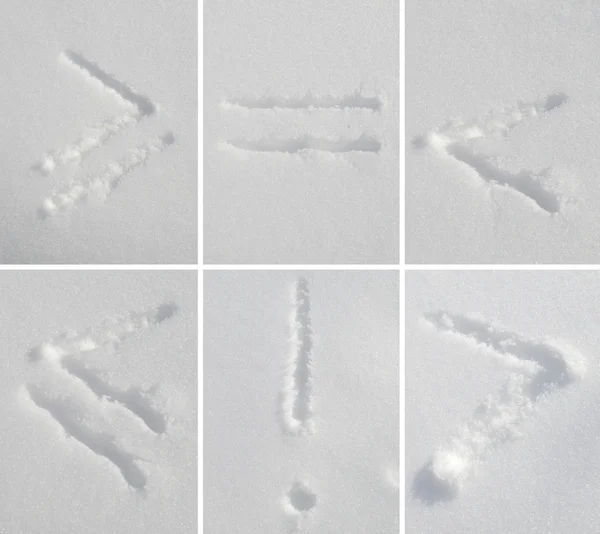 Die auf den Schnee gemalten Symbole und geometrischen Figuren — Stockfoto