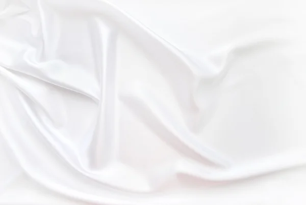 Soepele elegante witte zijde achtergrond — Stockfoto