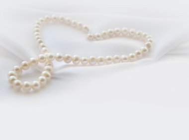 Zarif beyaz arka plan ile dantel, ipek ve inci