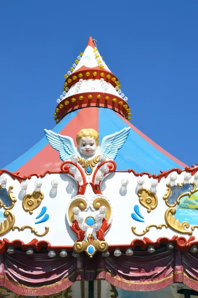 Detalhe de um carrossel com cupidos, close-up — Fotografia de Stock