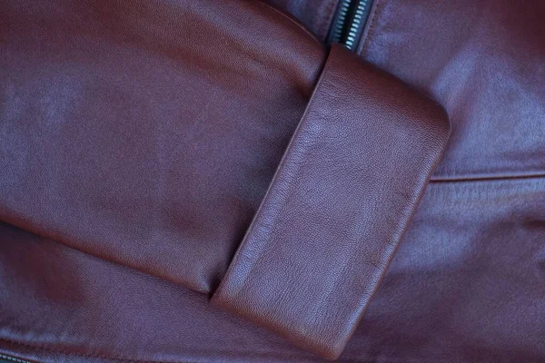 leather brown texture from the sleeve on the jacket