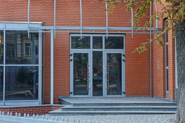 One Large Gray Closed Glass Door Red Brick Wall House — Stock Photo, Image