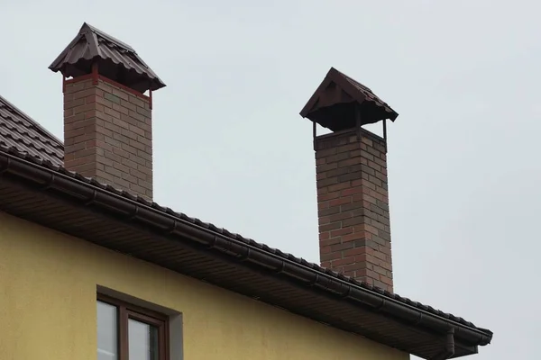 Two Brown Brick Chimneys Roof Private House Gray Sky — Stock Photo, Image