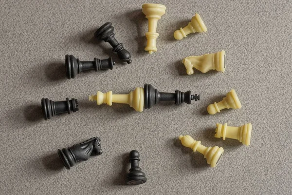 Many Black White Chess Figures Lie Gray Table — Zdjęcie stockowe