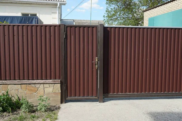 One Closed Brown Metal Door Part Fence Street — Stock Photo, Image