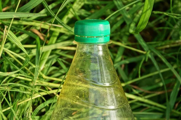 Part One Empty Closed White Plastic Bottle Green Grass Nature — Stock Photo, Image