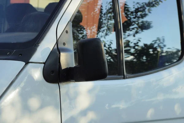 One Big Black Plastic Car Mirror Next Gray Glass White — Stock Photo, Image