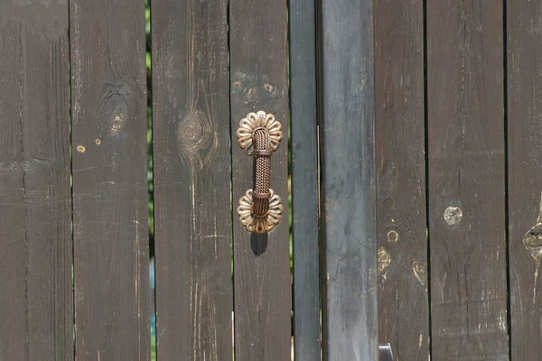 One Metal Doorknob Brown Shabby Wooden Door Street — ストック写真