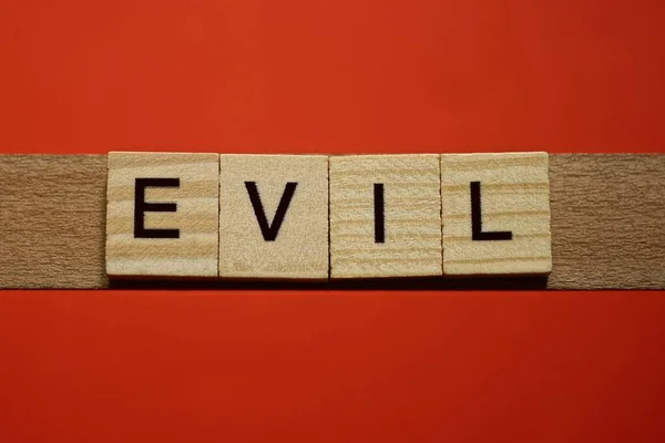 Text Word Evil Gray Wooden Small Letters Black Font Red — Stock Photo, Image