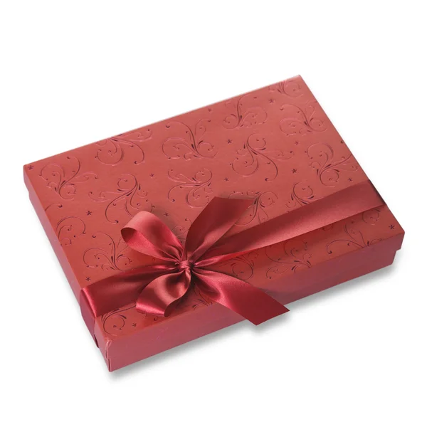 Rote Geschenkschachtel auf weißem Hintergrund — Stockfoto