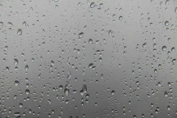 Chuva em vidro, textura de fundo — Fotografia de Stock