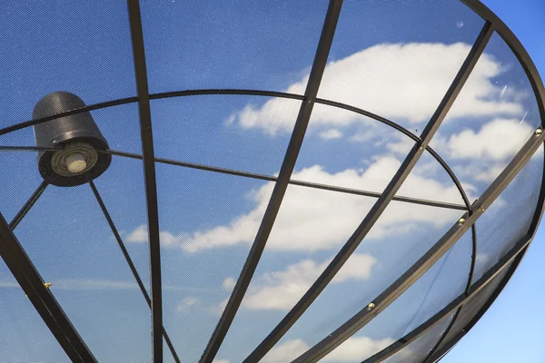 Satellite dish on blue sky — Stock Photo, Image