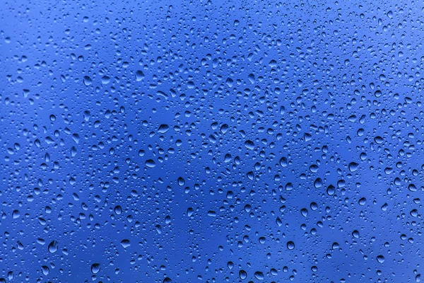 Raindrops on glass background — Stock Photo, Image