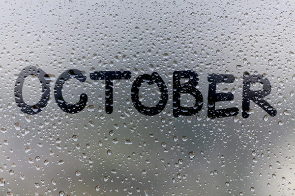 Η επιγραφή στο γυαλί, έννοια του Οκτωβρίου — Φωτογραφία Αρχείου