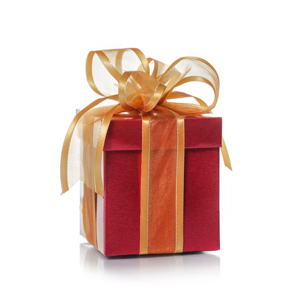 Red gift box on a white background — Stock Photo, Image